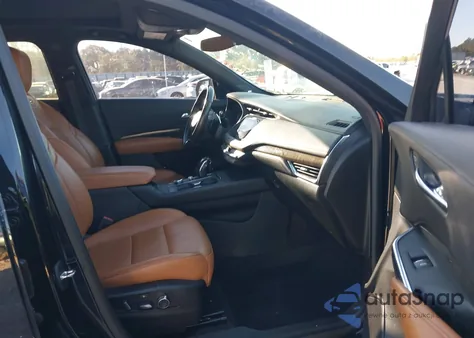 2019 Cadillac Xt4 Sport from USA, damaged, VIN 1GYFZER43KF171211